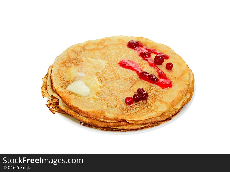 Russian pancake with cranberry and melting butter, on white background