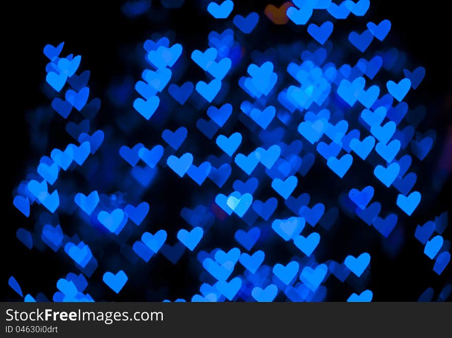 Blurred of heart shape christmas light, Can be used as background