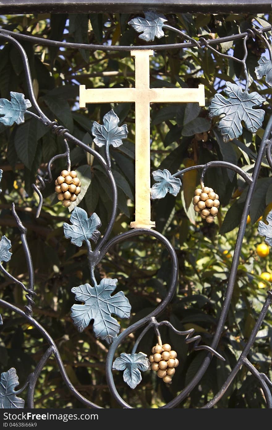 Cross on a forged wrought in the Church of the First Miracle.Kefar Cana, Israel