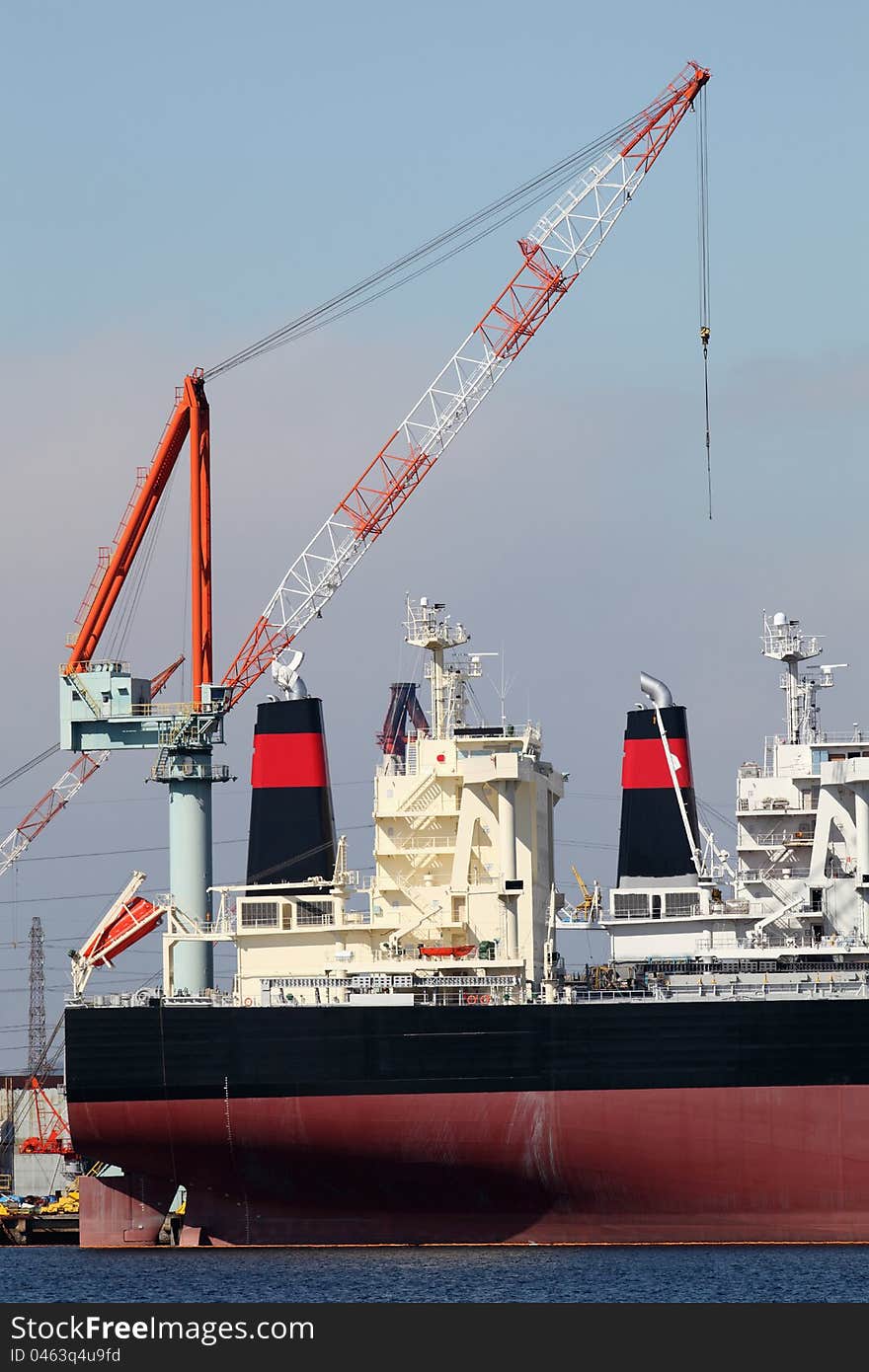 Container cargo ship docked in port