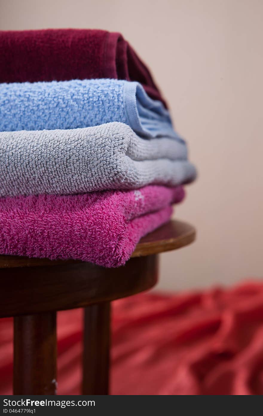 Pile of cotton Colorful towels On a table