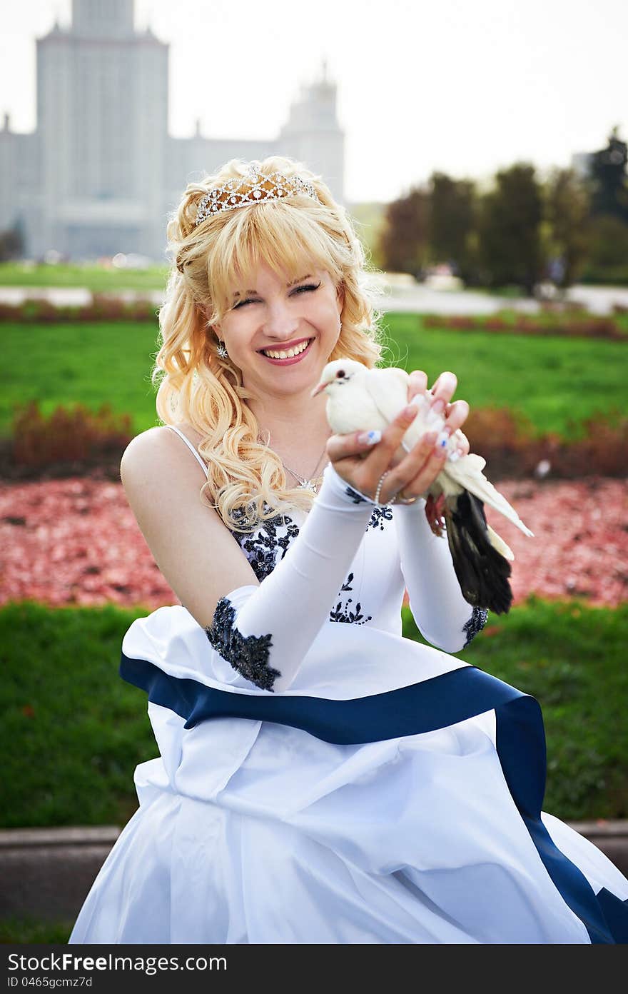 Happy bride with pigeon