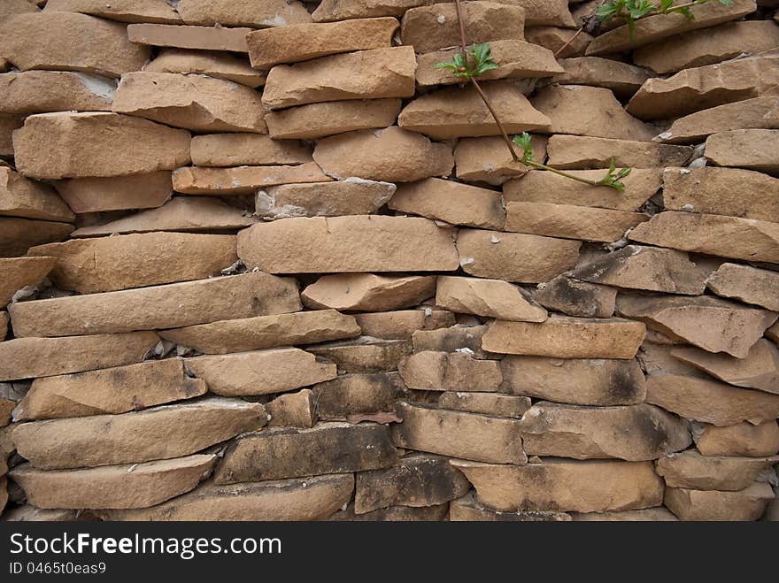 Stone wall in Wat Pha Son Keaw temple, Thailand.