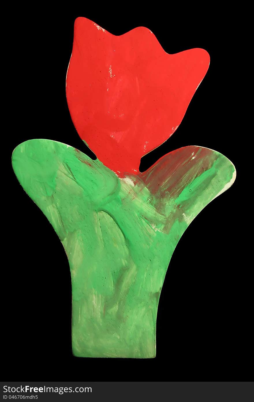 A red handmade handicraft tulip by children. A red handmade handicraft tulip by children