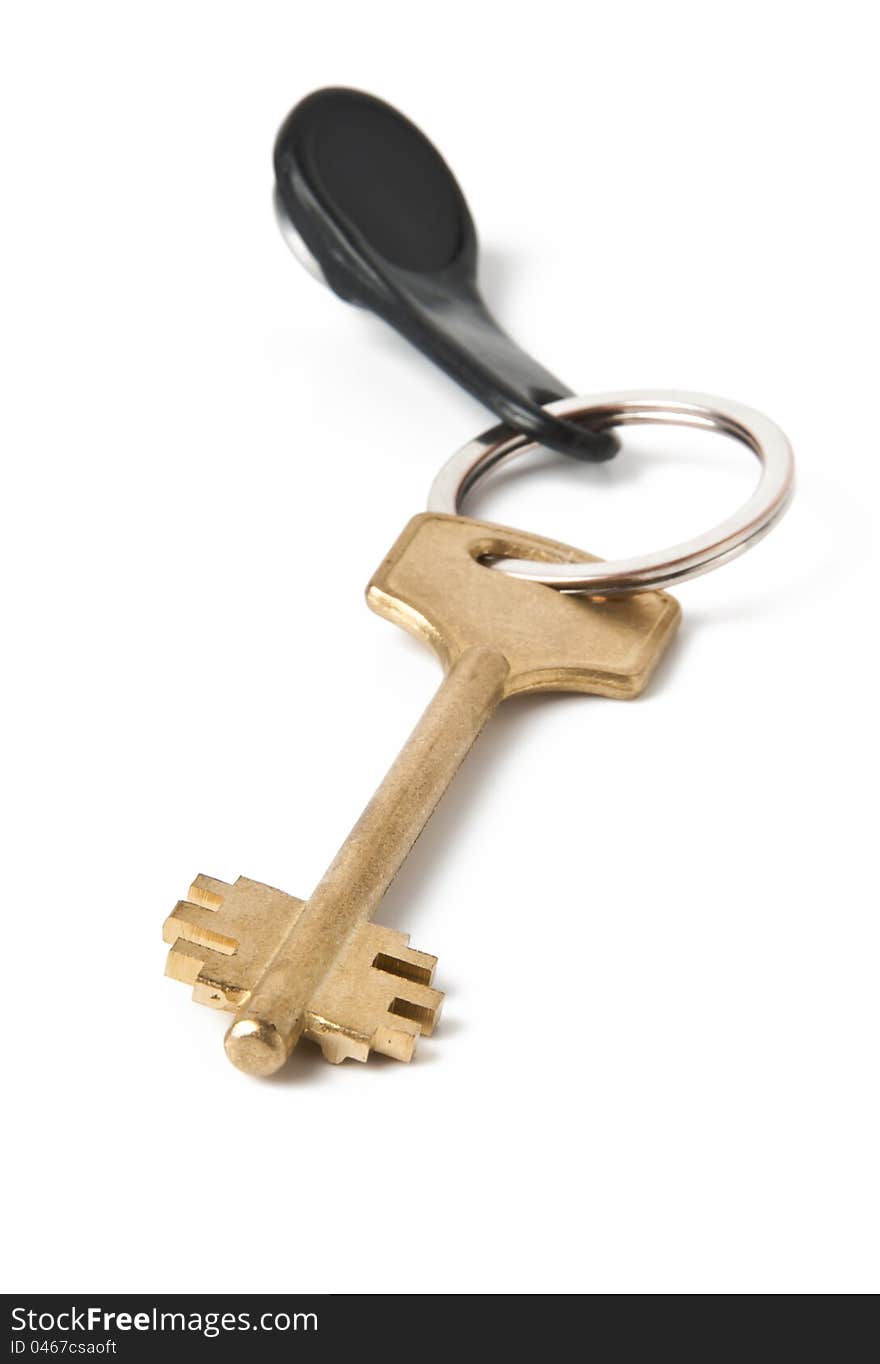 Golden key on white background. Golden key on white background