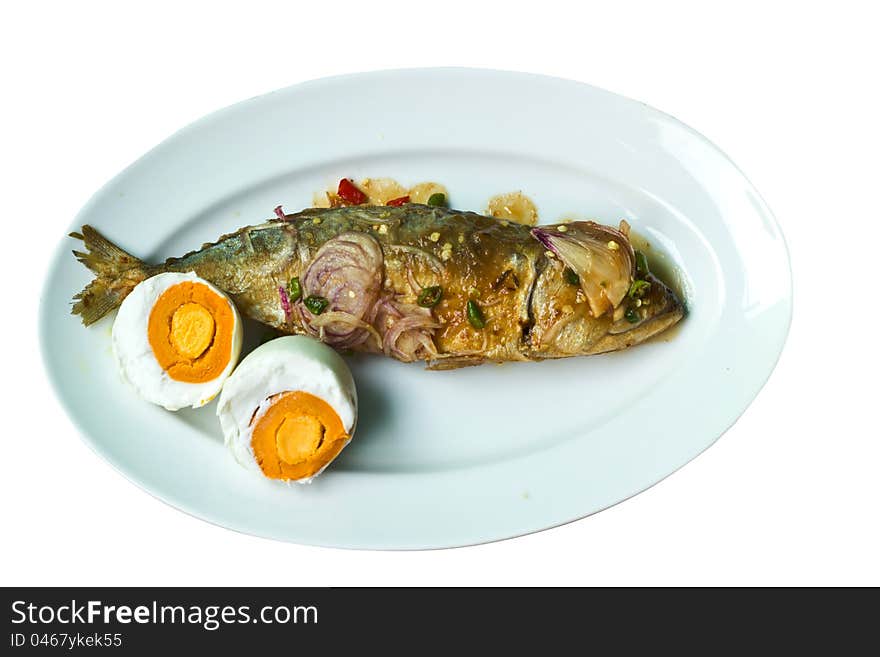 Salt and salted fish dishes on a white background. Salt and salted fish dishes on a white background.