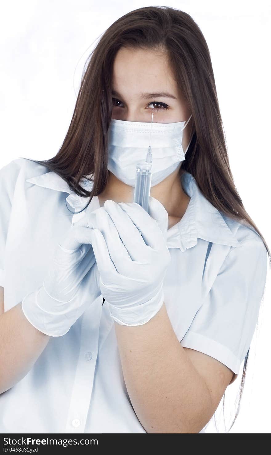 Healthcare and medicine: nurse using a syringe