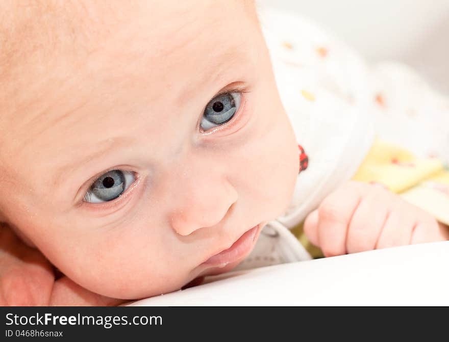 Attentive, pensive and sad sight of a baby. Attentive, pensive and sad sight of a baby