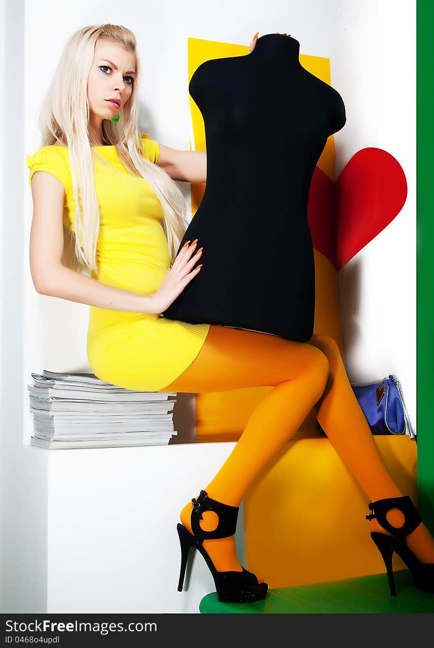 Art portrait of pretty young woman blonde hair with black mannequin - series of photos. Art portrait of pretty young woman blonde hair with black mannequin - series of photos