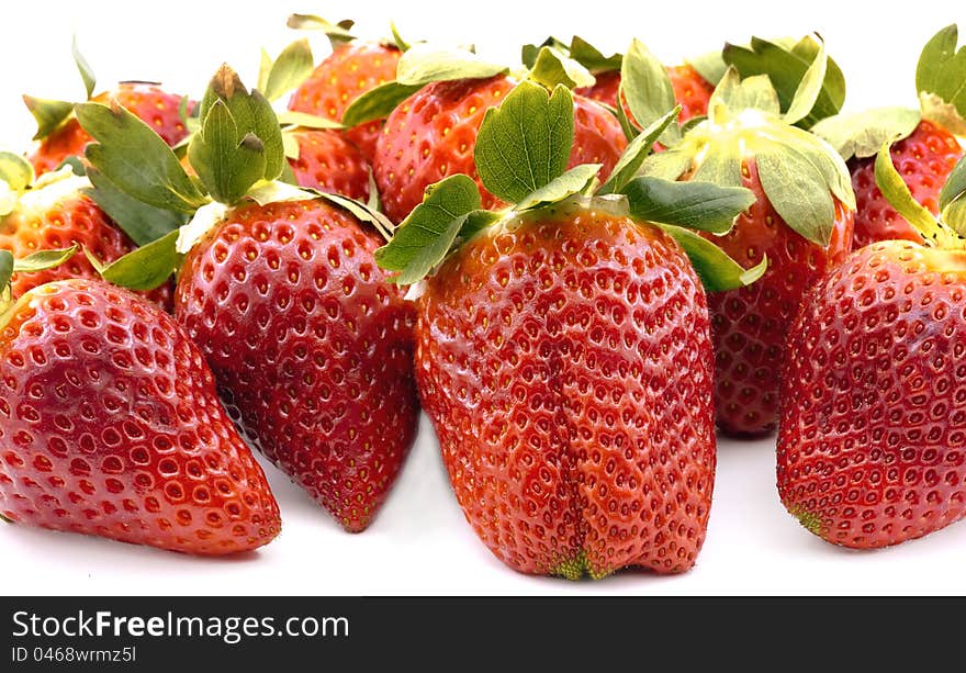 Organic garden strawberry on white background. Organic garden strawberry on white background