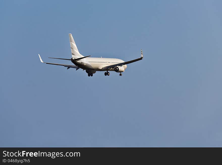 Two engines aircraft prepares for landing