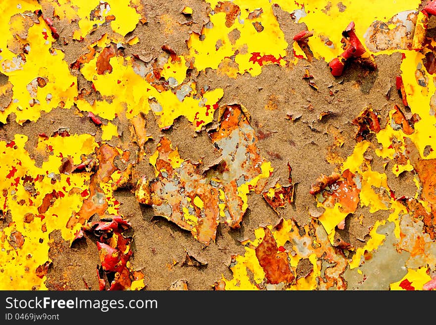 The old paint on the walls of the damaged decay