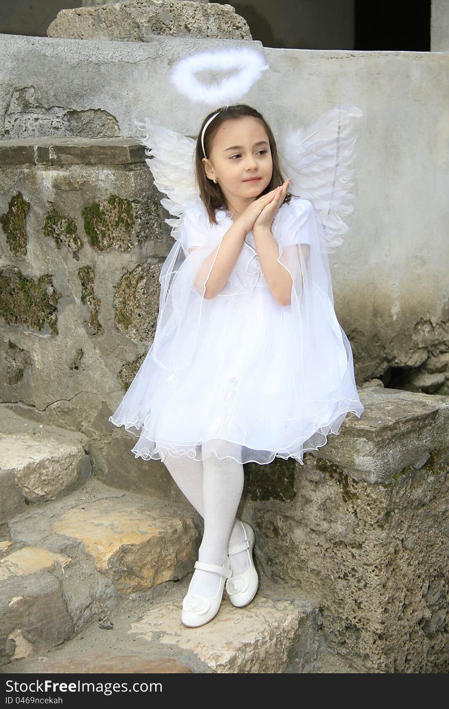 Girl dressed as an angel. Girl dressed as an angel