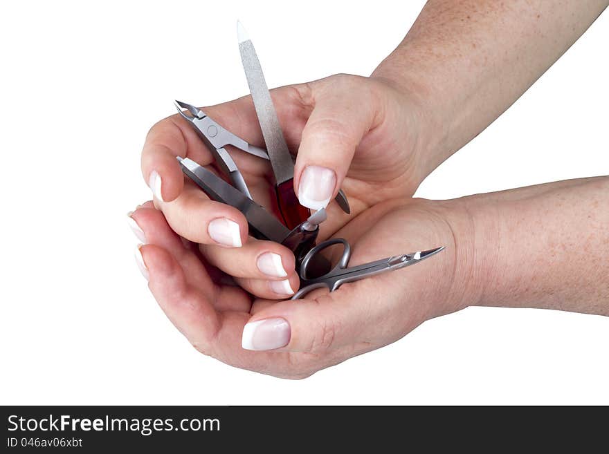 The Hands Holding A  Manicure Set