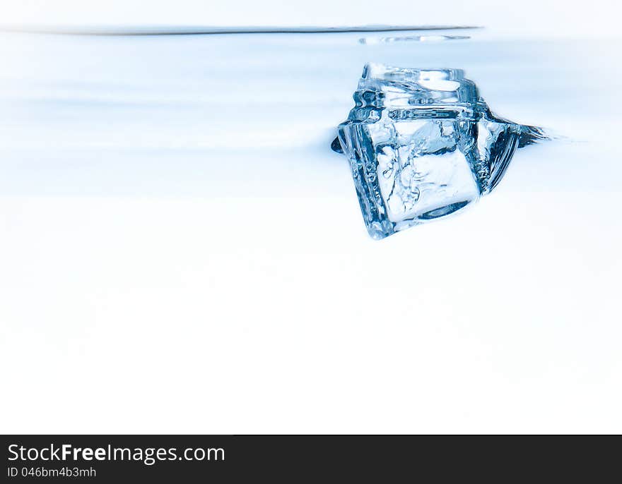 Ice cube in water