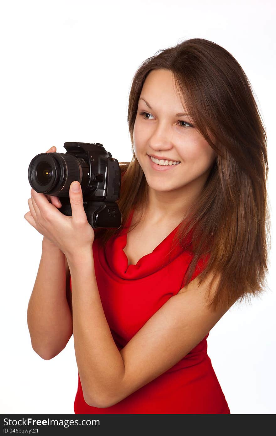 The yoing girl with the digital camera. The yoing girl with the digital camera