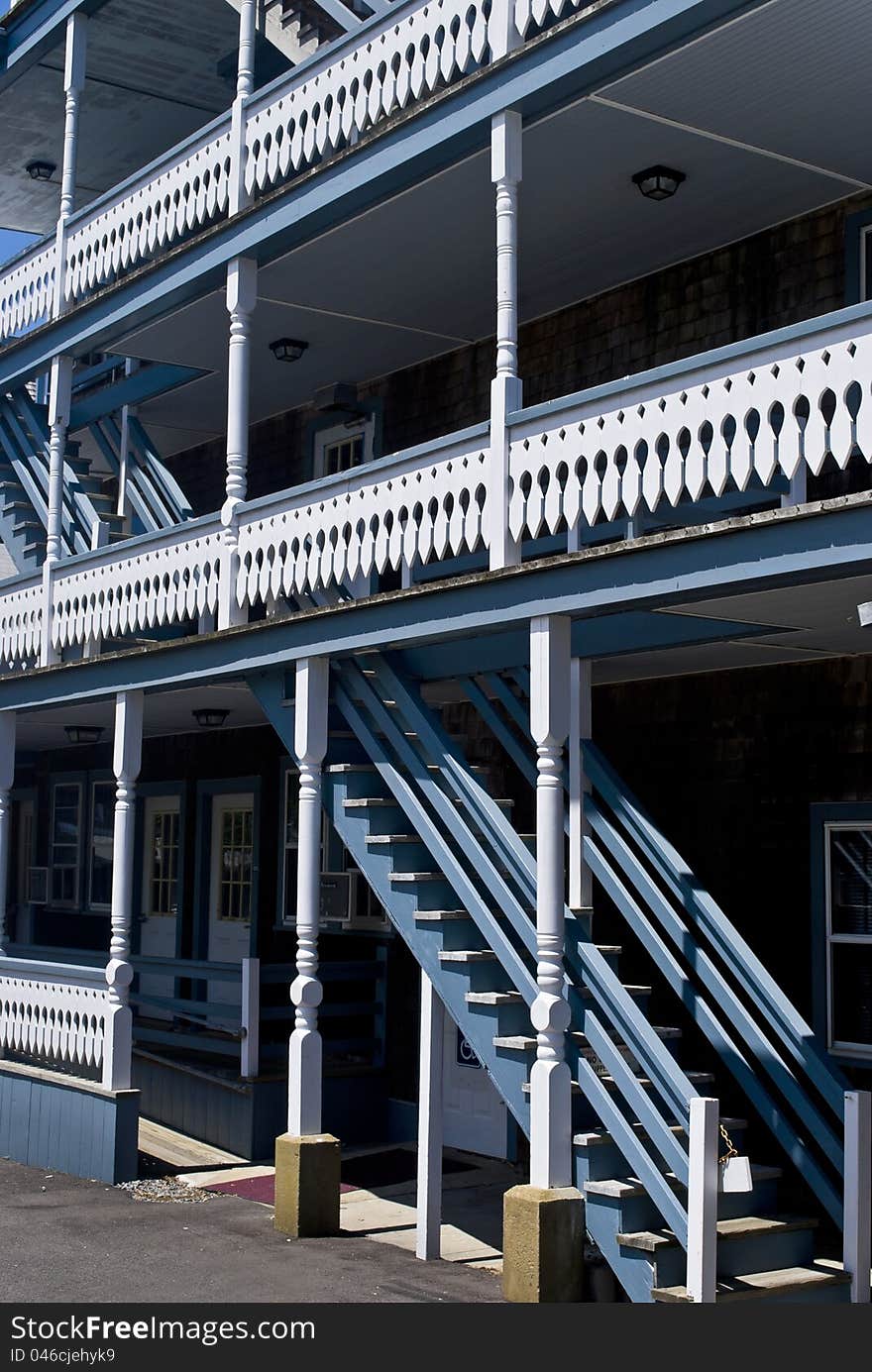 Old fashioned wooden double decks on this building in  Cape Cod, Massachusetts. Old fashioned wooden double decks on this building in  Cape Cod, Massachusetts.