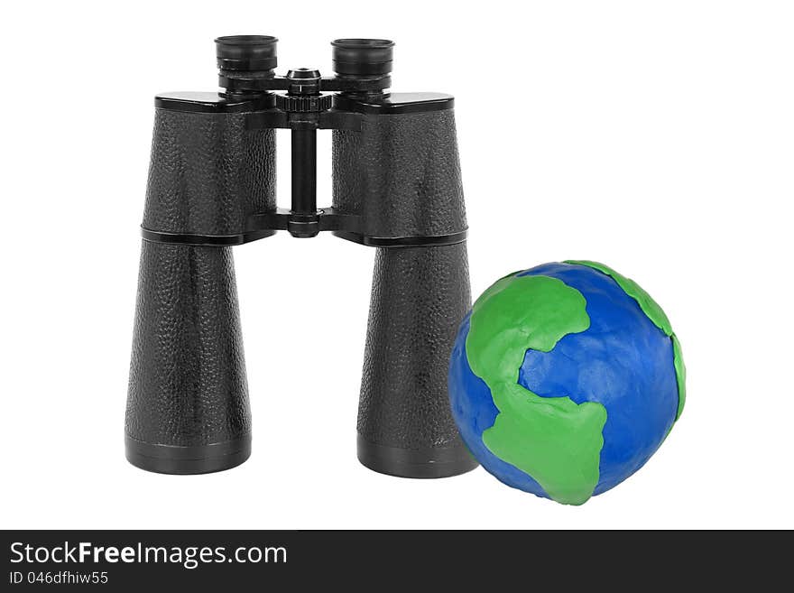 Modern binoculars and white plasticine Globe. Modern binoculars and white plasticine Globe