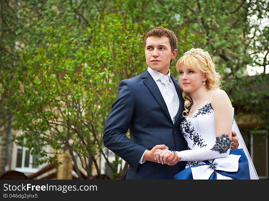 Bride and groom on floral background