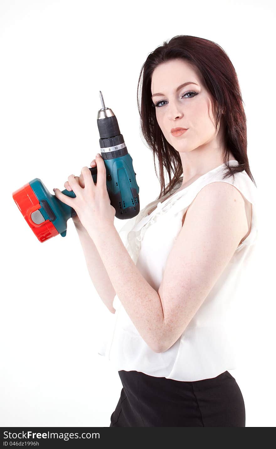 Young brunette posing with drill. Young brunette posing with drill