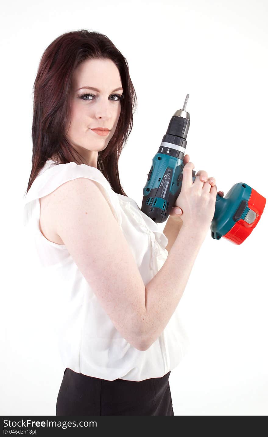 Young brunette posing with drill. Young brunette posing with drill