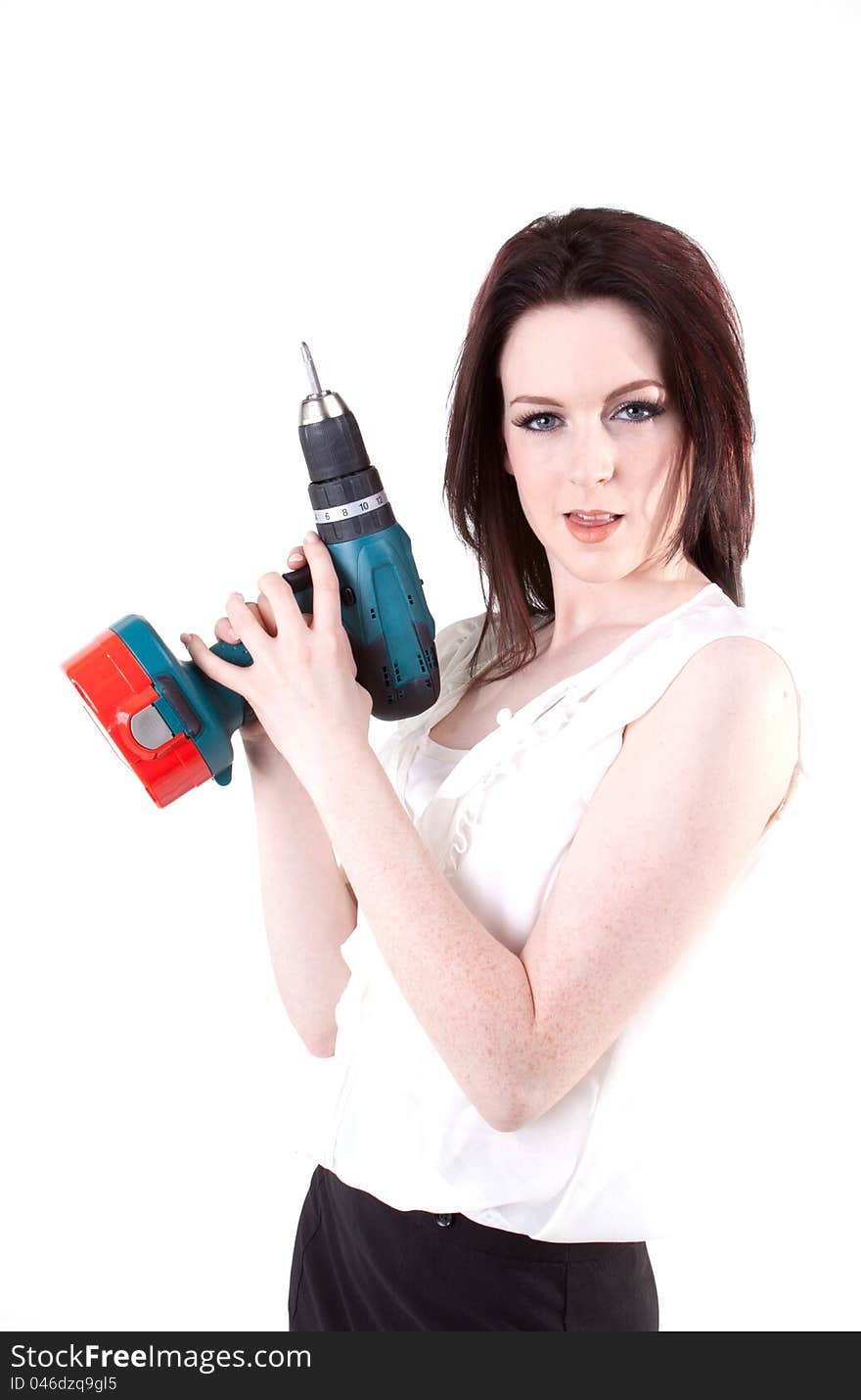 Young brunette posing with drill. Young brunette posing with drill