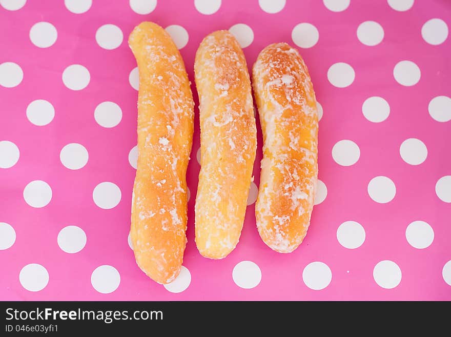 Breads On Polka Dot Pink Background