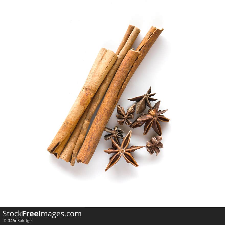 Cinnamon  and anise  on white background