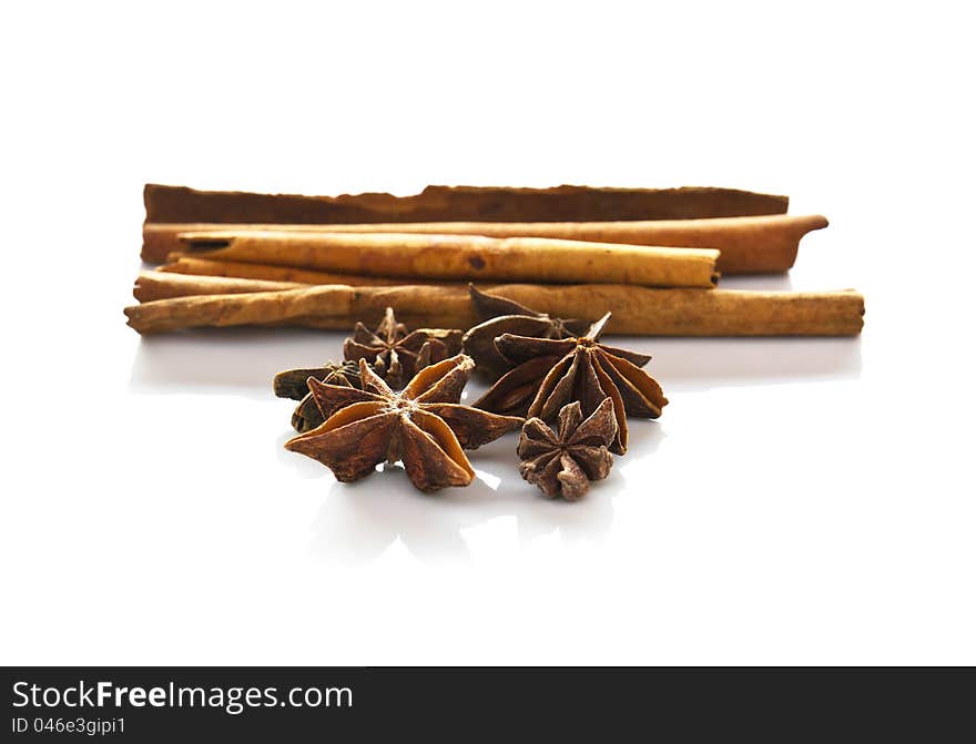 Cinnamon  and anise  on white background