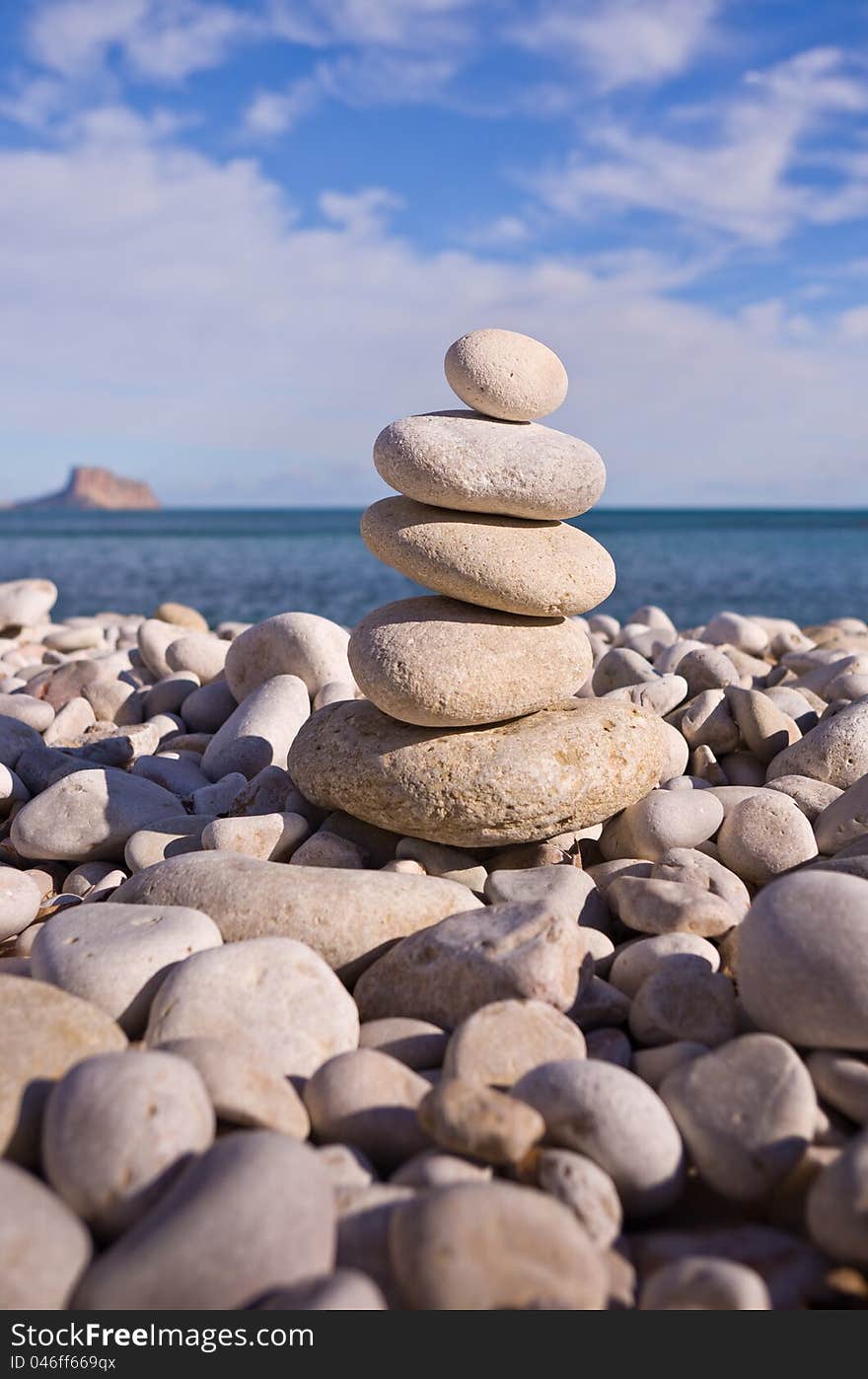 Balanced Pebbles On Beach