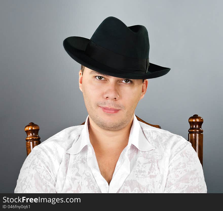 Portrait Of Young Man In A Hat