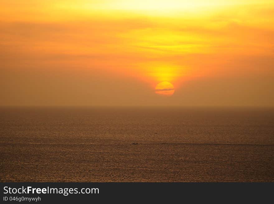 Sunset reflection on water with golden color. Sunset reflection on water with golden color.