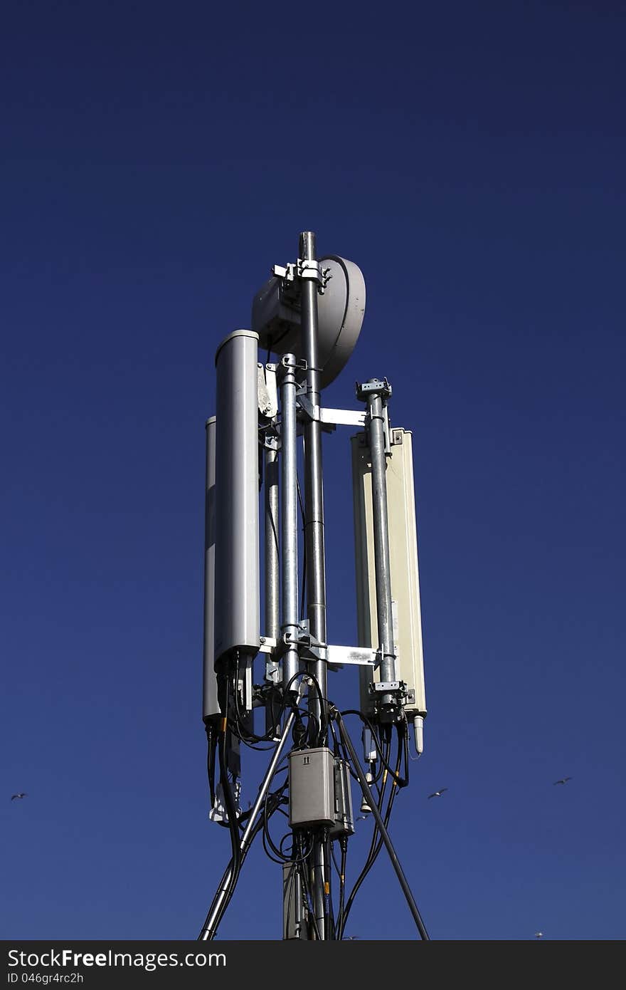 Mobile communication antenna, blue sky background