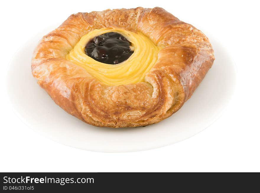 Picture of a Blue berry danish pie on a plate