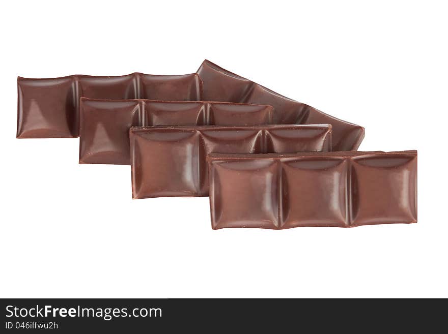 Chocolate pieces isolated on a white background