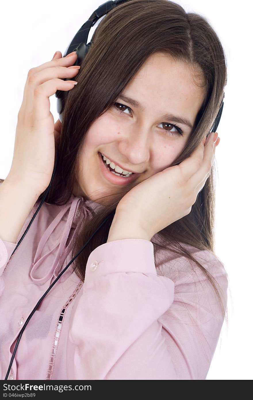 Woman with eyes closed listening to music on headphones. Woman with eyes closed listening to music on headphones.