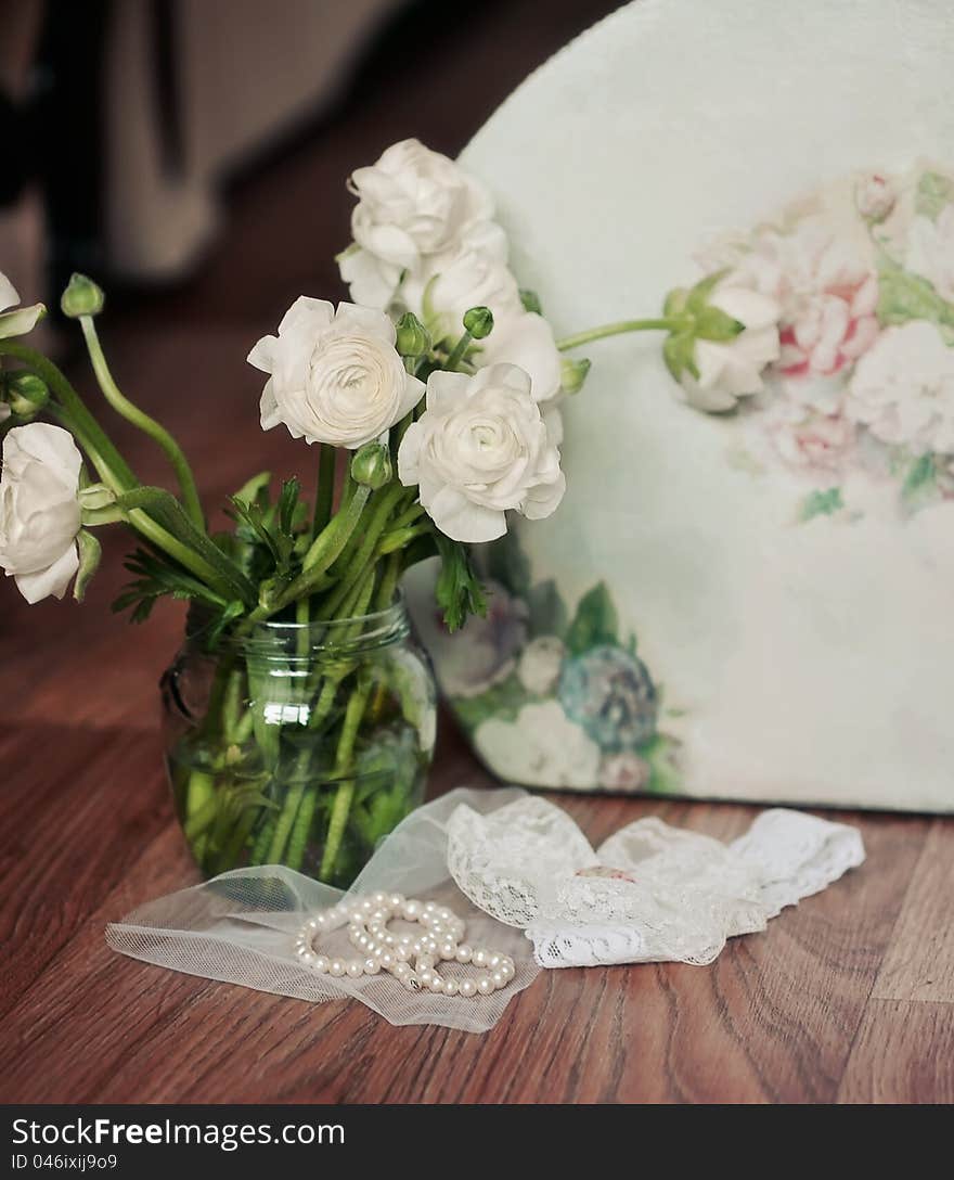 Gentle spring bouquet in a vase on a color cloth. Gentle spring bouquet in a vase on a color cloth