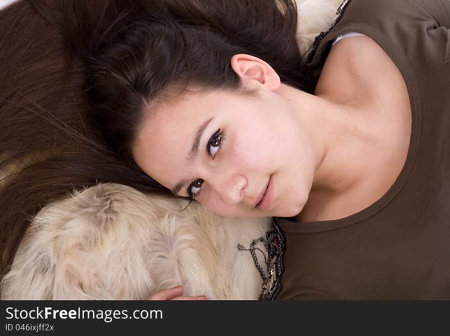 Female face with long luxuriant hair