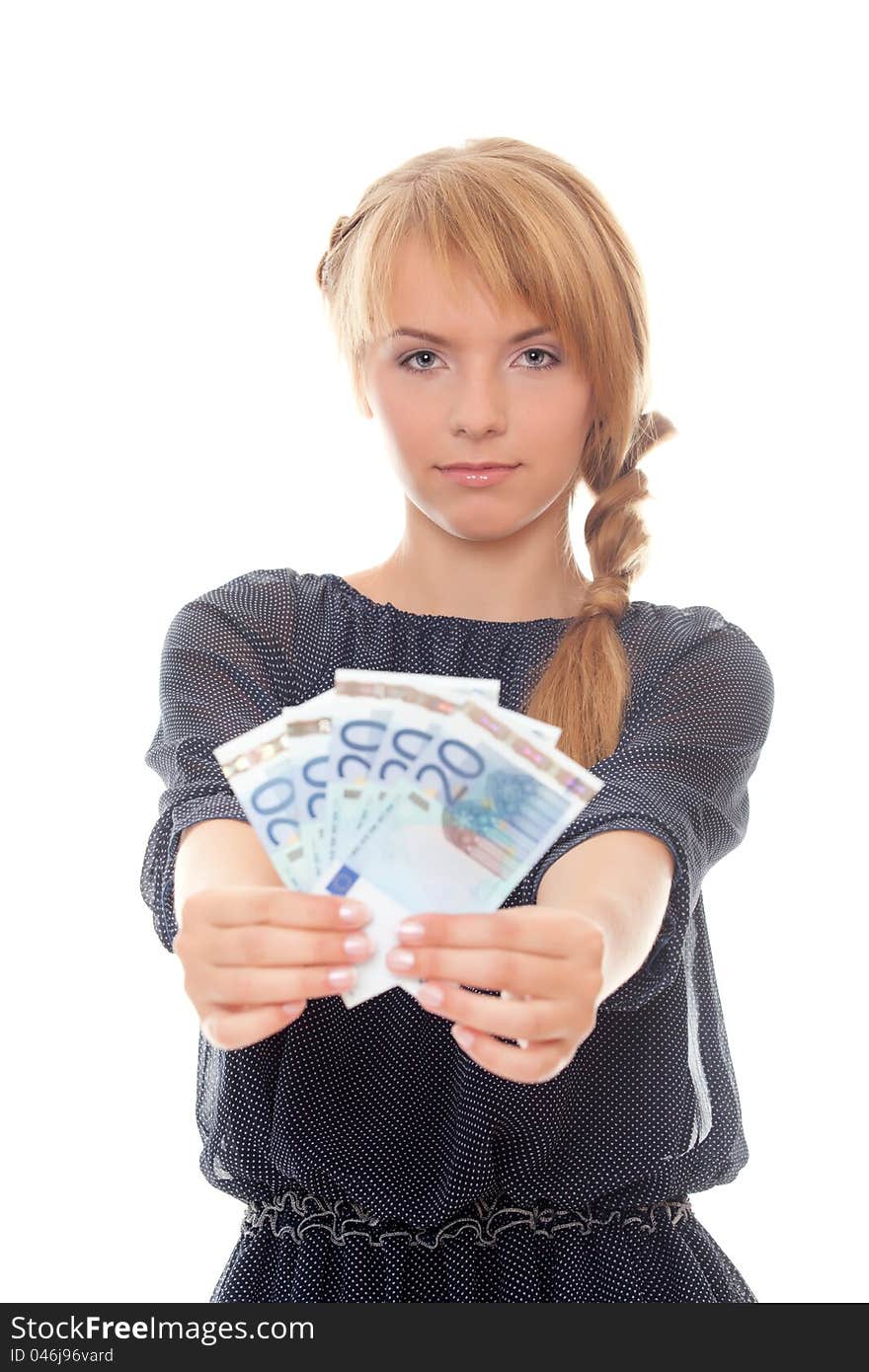 Young woman holding money in his outstretched hands isolated on white background. Young woman holding money in his outstretched hands isolated on white background