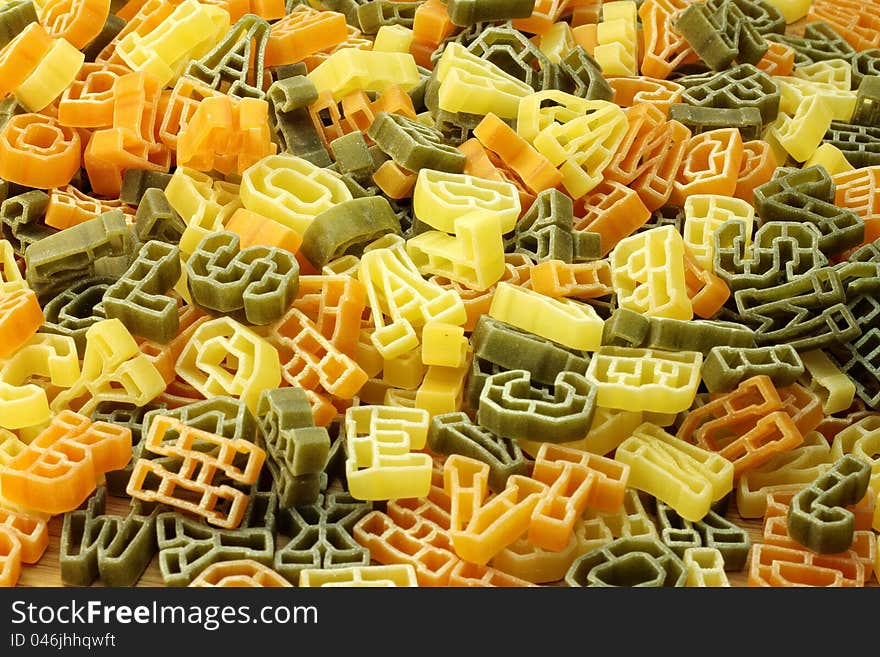 Alphabet from pasta,  under white light. Alphabet from pasta,  under white light.