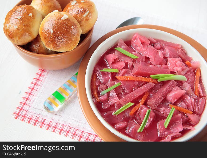 Beetroot soup and garlic buns