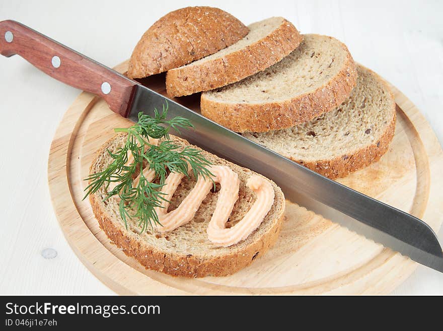 Bread made ​​from rye and wheat flour with fish paste and dill. Bread made ​​from rye and wheat flour with fish paste and dill