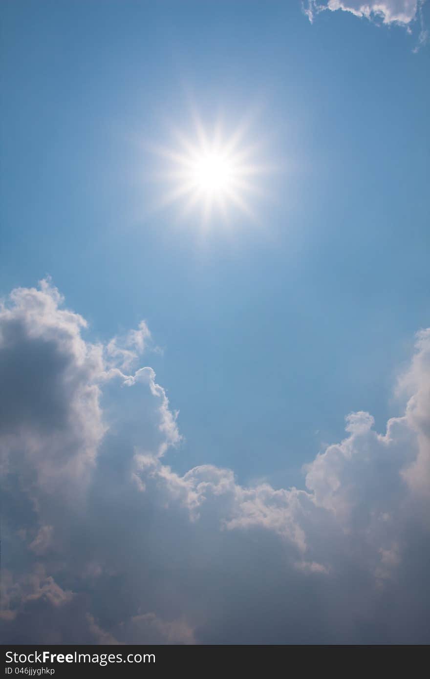 Blue sky with clouds and sun shine the pentagram in bangkok