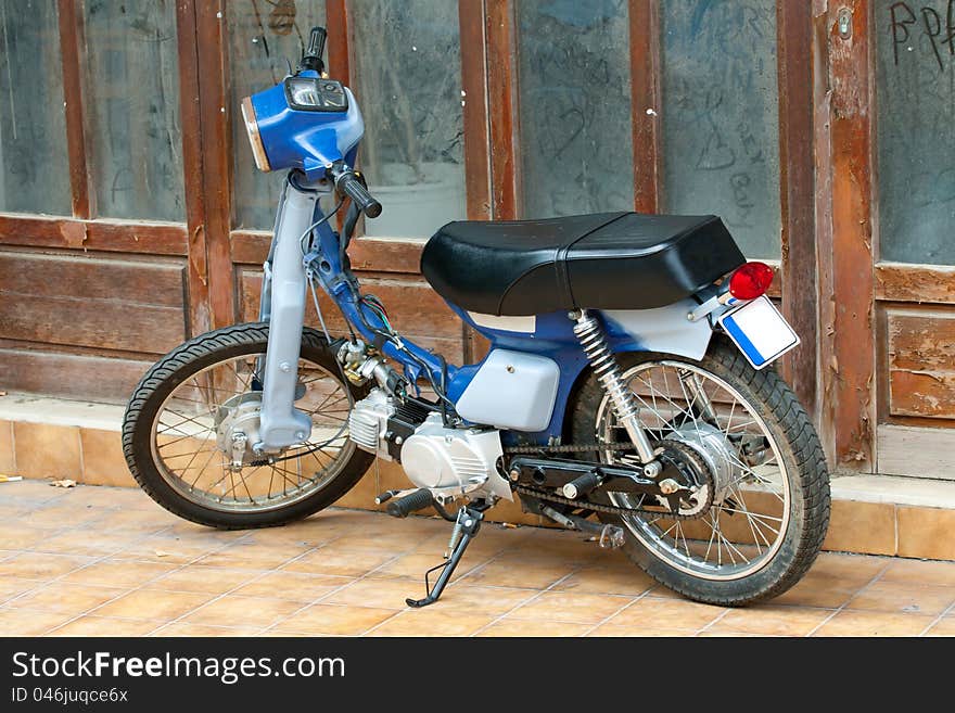 Old motorcycle on the street of Greece