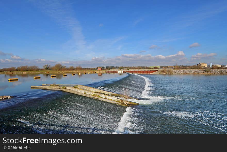 Weir and Barrier on the Jubilee Flood relief River in England. Weir and Barrier on the Jubilee Flood relief River in England