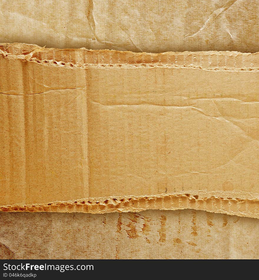 Riped grunge cardboard background. Place for your text