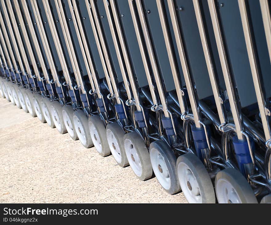 Row Of Luggage Carts Wheels