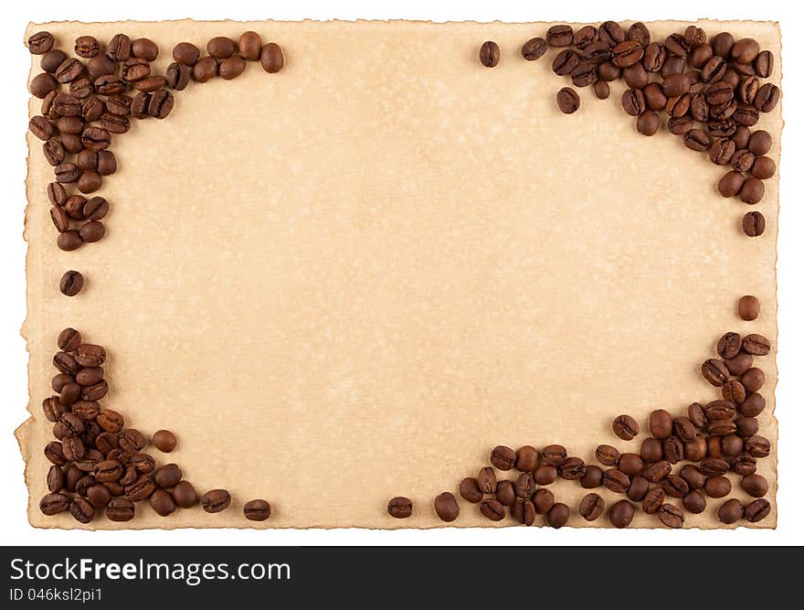 A frame made from coffee crops on hand-made paper and isolated on white. Place for text.