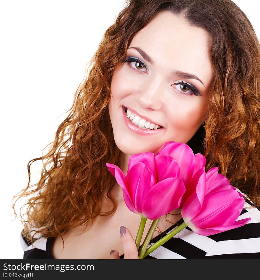 Beautiful woman with flowers and bags