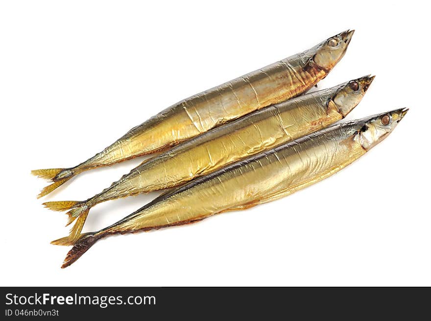 Three smoked saury fish on a white background